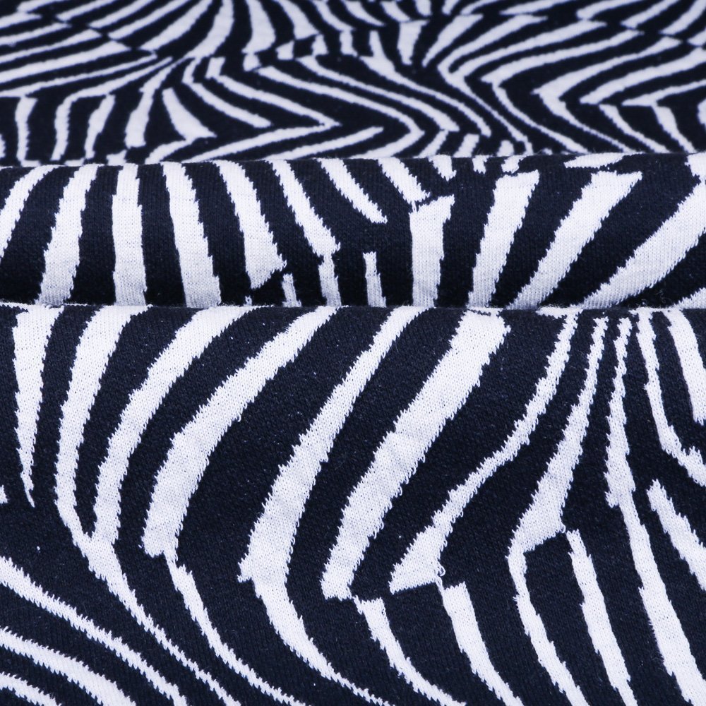 Tissu Gianni Maille Extensible Marine Vagues tigrés Blanches