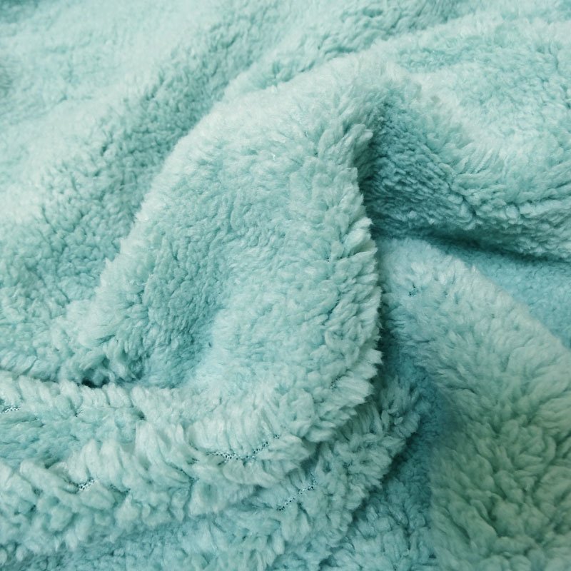 Fausse fourrure mouton Bleu cyan