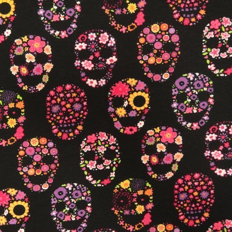 Tissu Jersey Coton Noir Têtes de mort roses et oranges