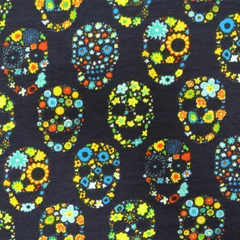Tissu Jersey Coton Bleu marine Têtes de mort vertes et bleus