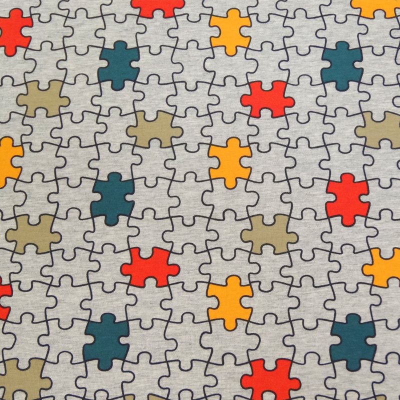 Tissu Jersey Coton Gris Puzzles rouges et bleus