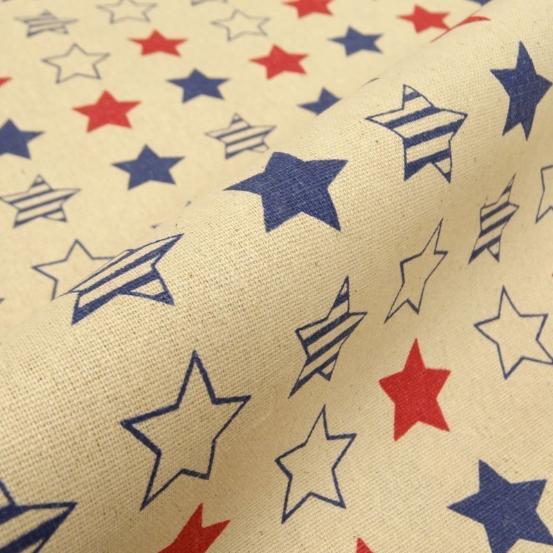 Tissu Toile Coton Beige Etoiles bleues