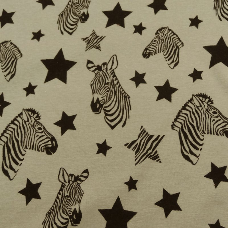 Tissu Sweat envers minky Beige Zèbres noirs