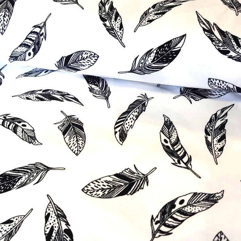 Tissu Jersey Coton Blanc Plumes noires