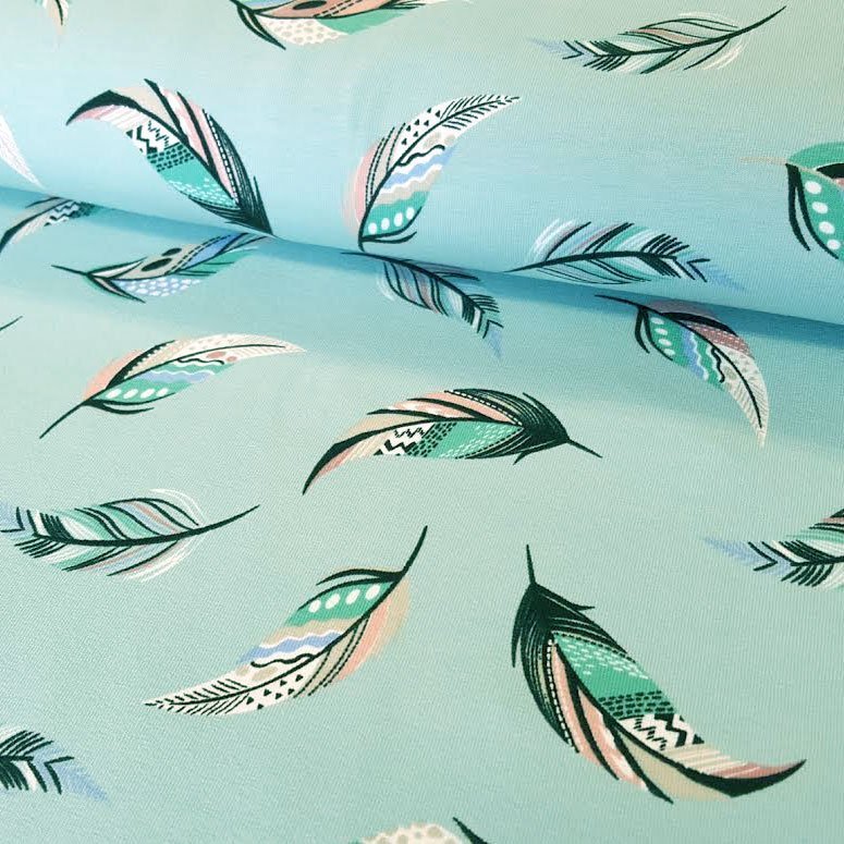 Tissu Jersey Coton Bleu vert Plumes multicolores