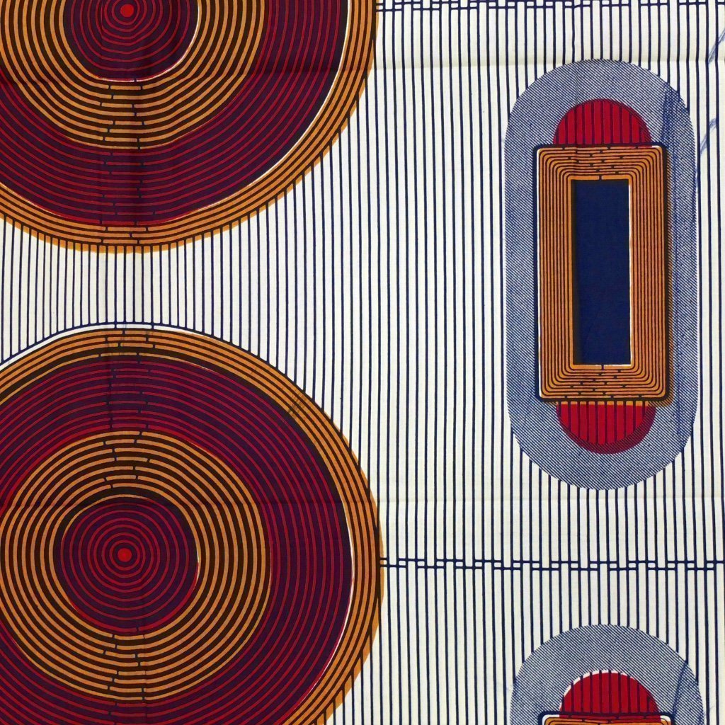 Tissu Wax Africain Bleu marine et blanc Motifs géométriques oranges et rouges