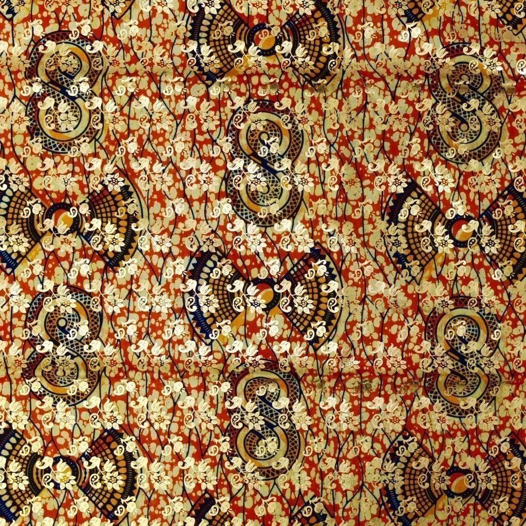 Tissu Wax Africain Lurex n°103 Orange Motifs géométriques jaunes