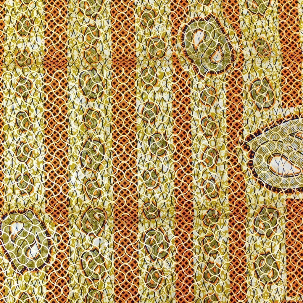 Tissu Wax Africain Lurex n°105 Marron clair Motifs géométriques oranges et noirs