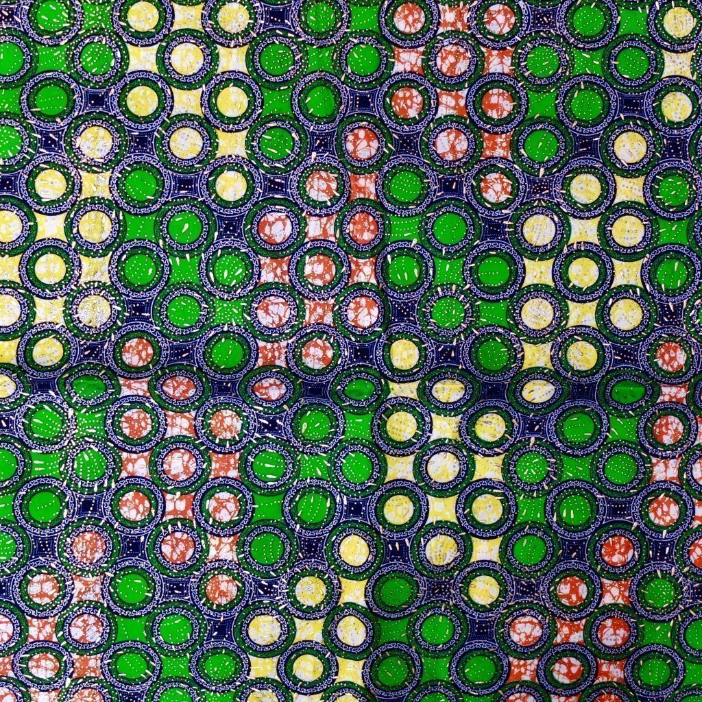 Tissu Wax Africain Lurex n°111 Vert pomme Motifs géométriques oranges et jaunes