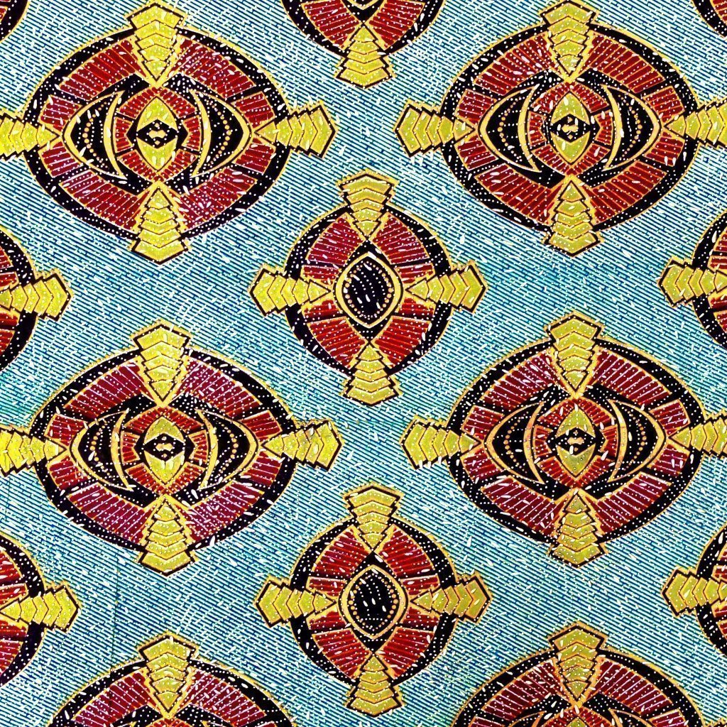 Tissu Wax Africain Lurex n°115 Vert clair Motifs géométriques oranges