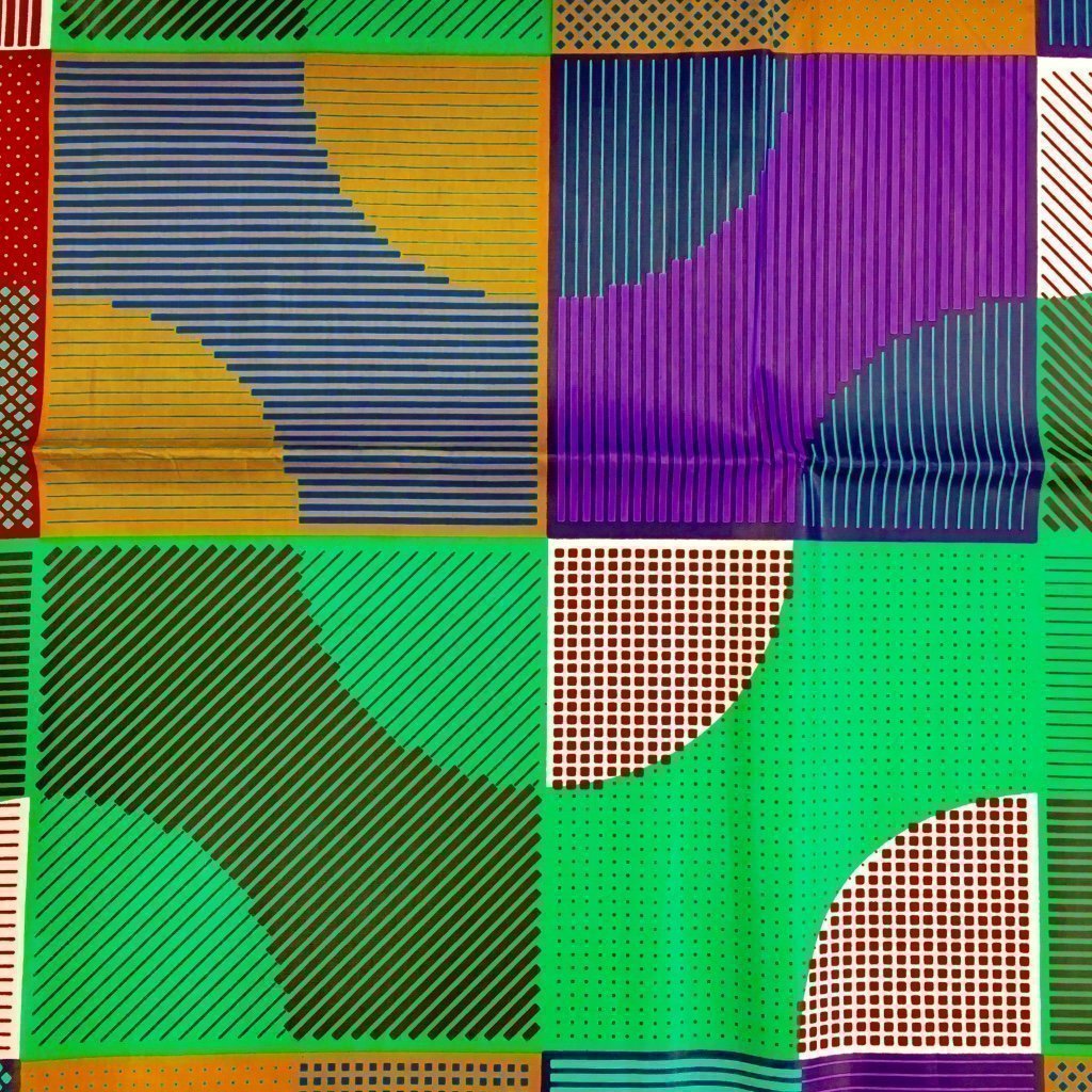 Tissu Wax africain Enduit n°194 Vert Motifs africain Violets et jaunes