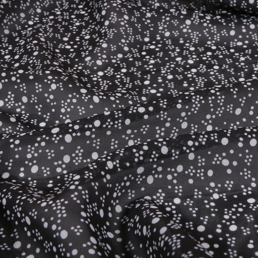 Tissu Mousseline nuée de Pois Noir