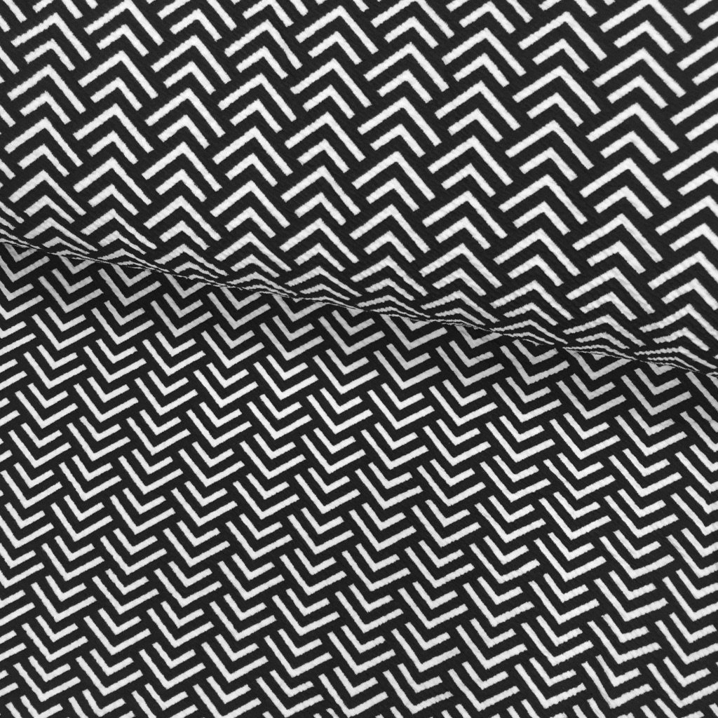 Tissu Jersey interlock Noir Chevrons Blancs