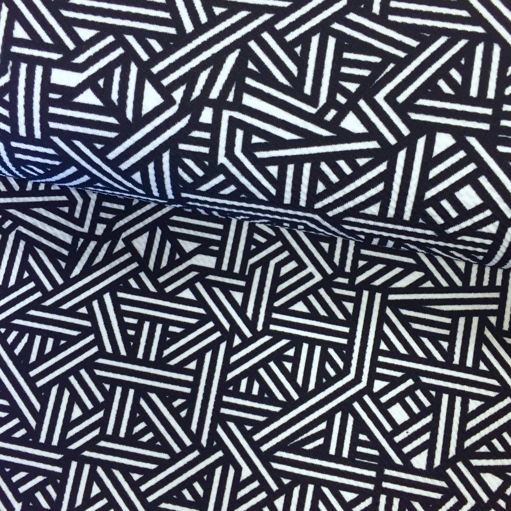 Tissu Jersey interlock Bleu foncé Motifs géométriques Blancs