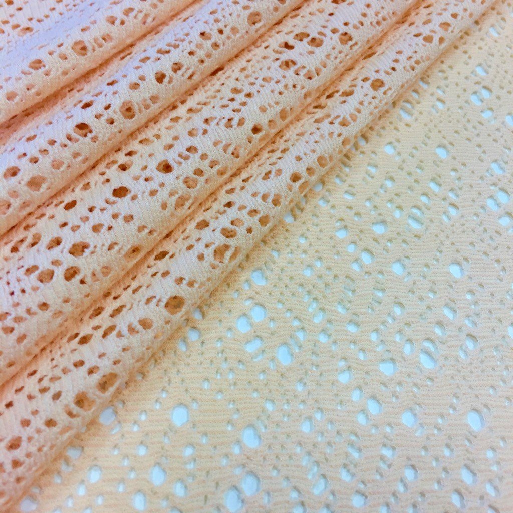 Tissu Jersey ajouré Saumon