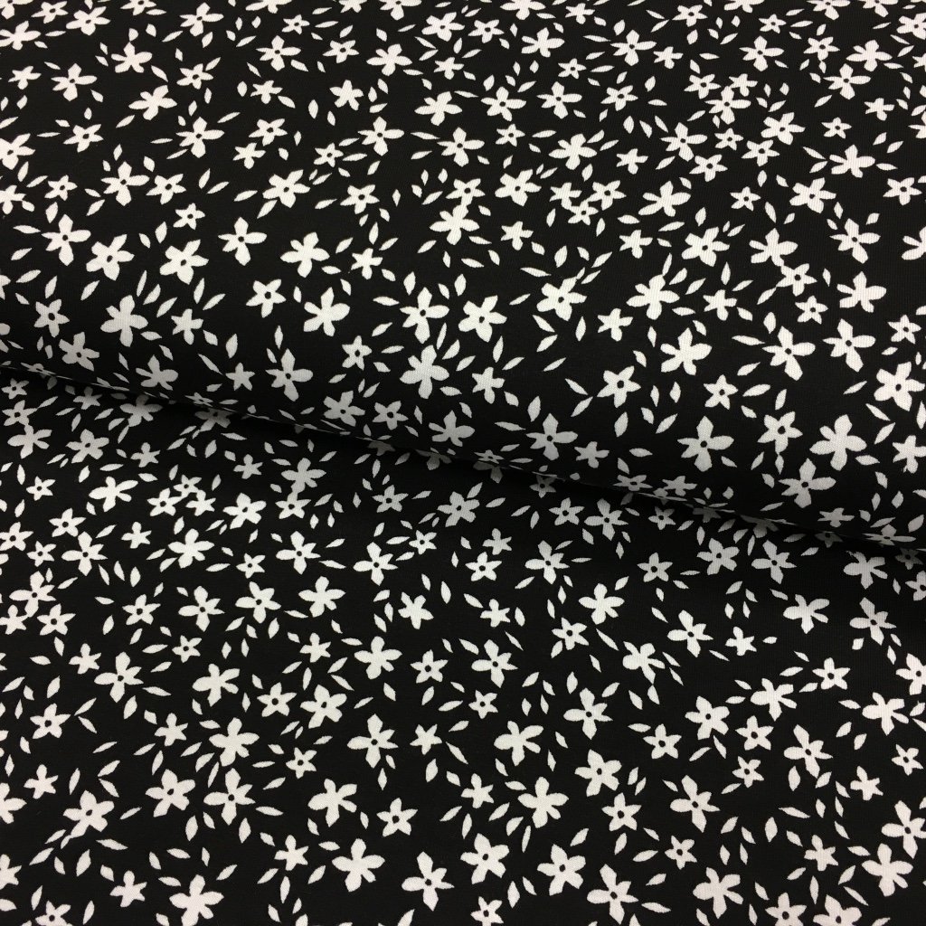 Tissu Jersey viscose Noir Paquerettes Blanches