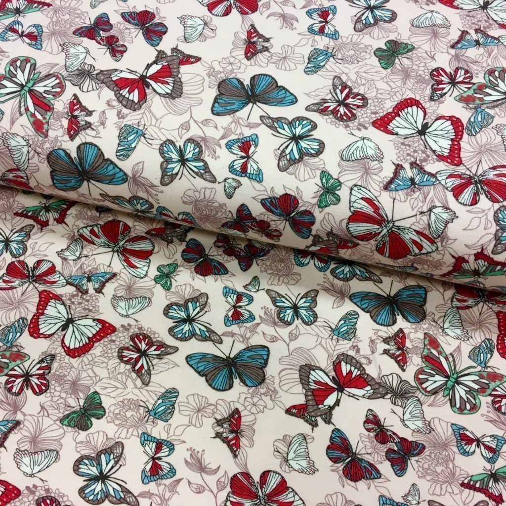 Tissu Jersey viscose Rose pâle Papillons Fuchsias et bleus