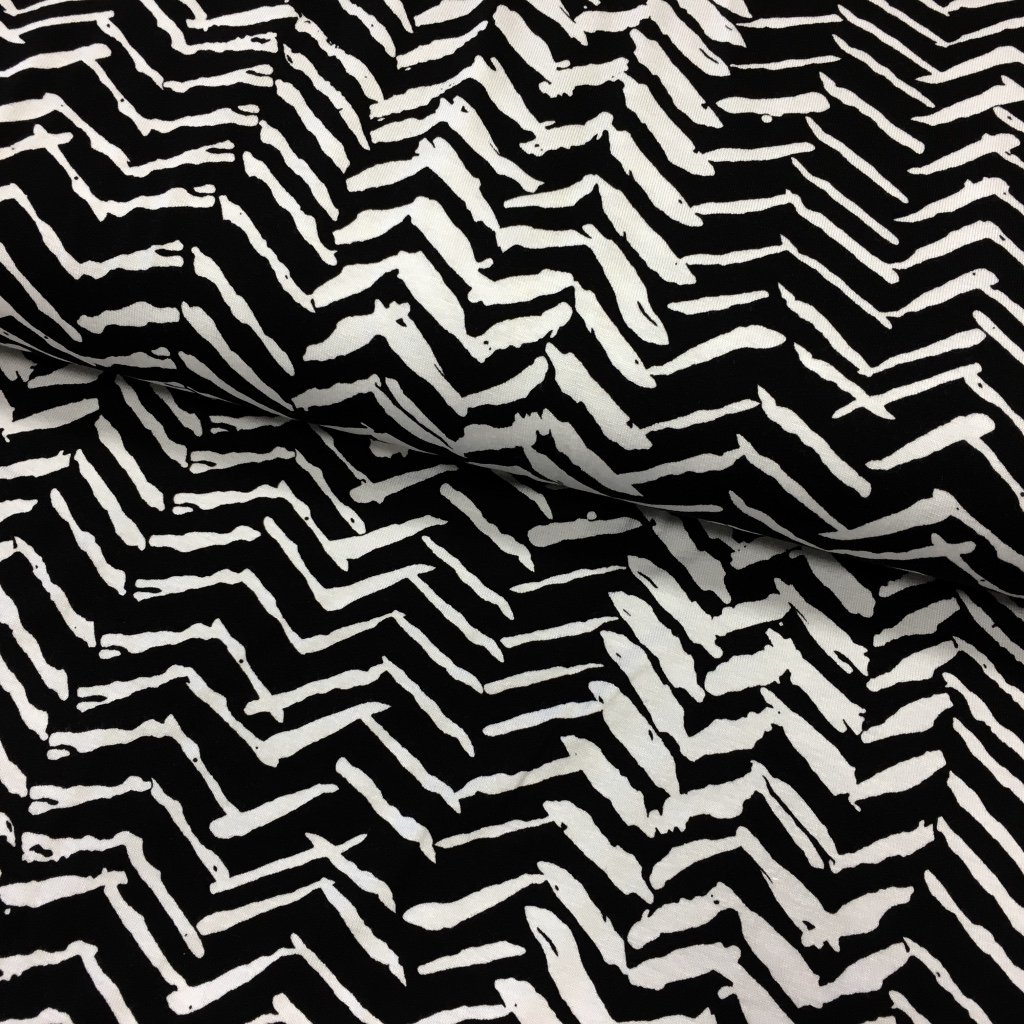 Tissu Jersey viscose Noir Motifs aztèques Blancs