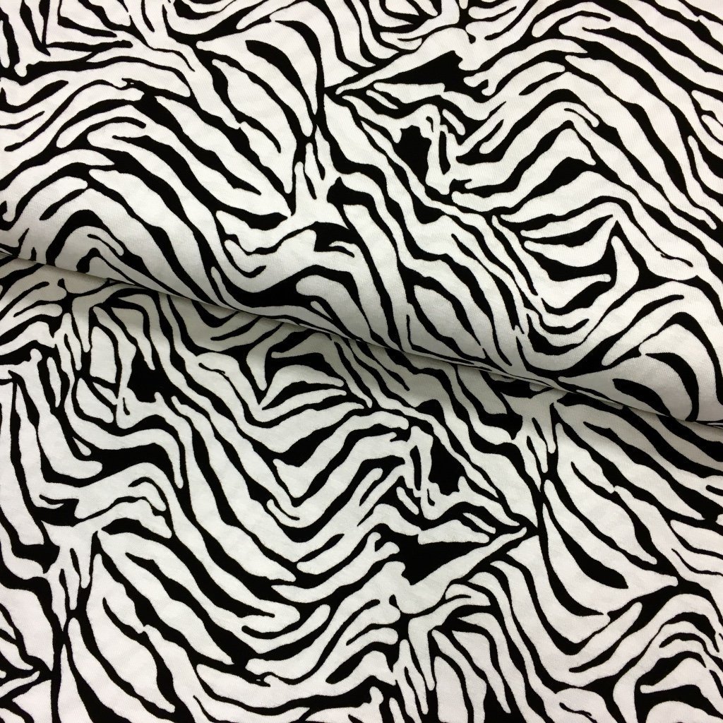Tissu Jersey viscose Blanc Motifs tigre Noirs