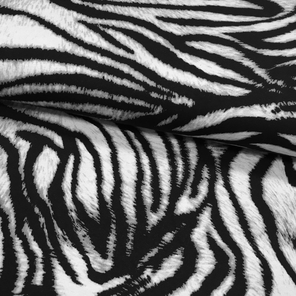 Tissu Jersey viscose Gris Motifs tigre Noirs