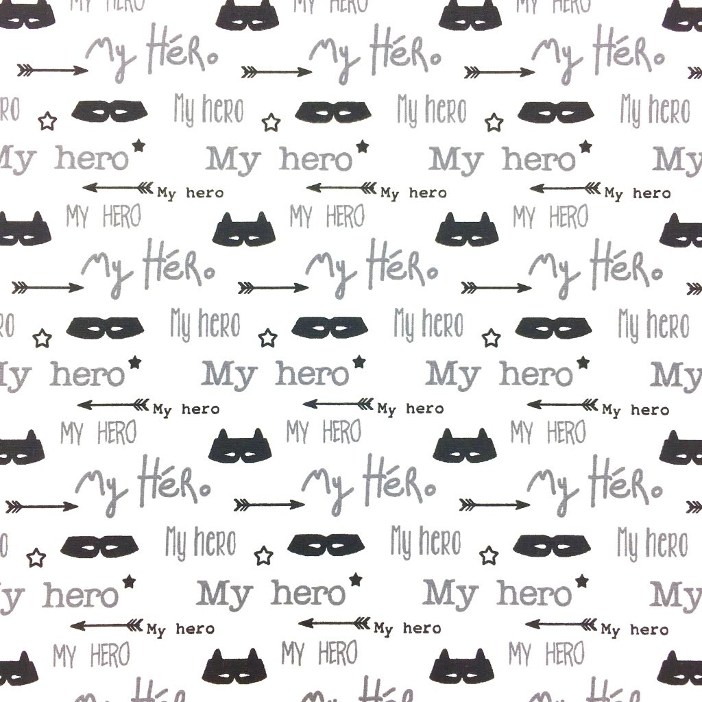 Tissu Coton Imprimé Arty Blanc Flèches, masques et lettres Noires et grises