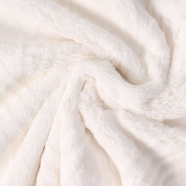 Tissu Fausse fourrure Wavy sur fond Blanc cassé - Par 10 cm