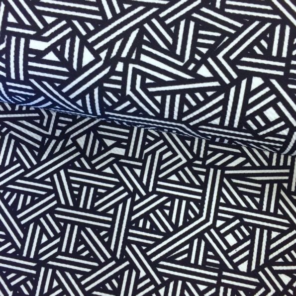 Tissu Jersey interlock Bleu foncé Motifs géométriques Blancs - Par 10 cm