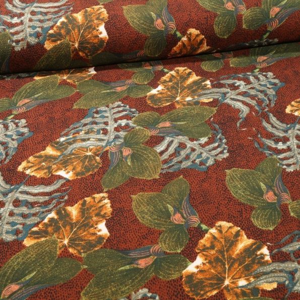 Tissu Crêpe imprimé Feuilles de Miltonia sur fond Rouille - Par 10 cm