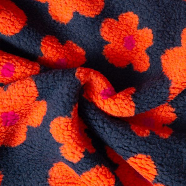 Tissu Sherpa Elya Fleurs oranges sur fond Bleu foncé - Par 10 cm