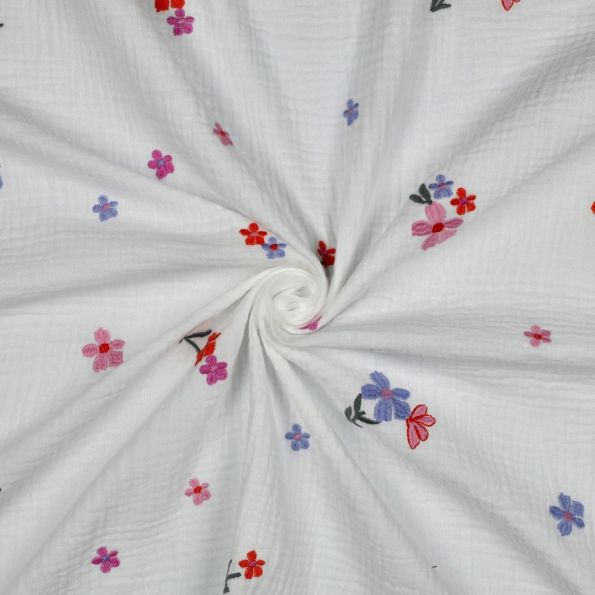 Tissu Double gaze de Coton Zohra petites fleurs brodées Bleu et Rose sur fond Blanc - Par 10 cm