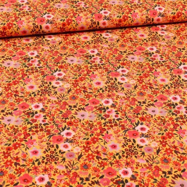 Tissu Coton imprimé Pâquerettes sur fond Orange - Par 10 cm