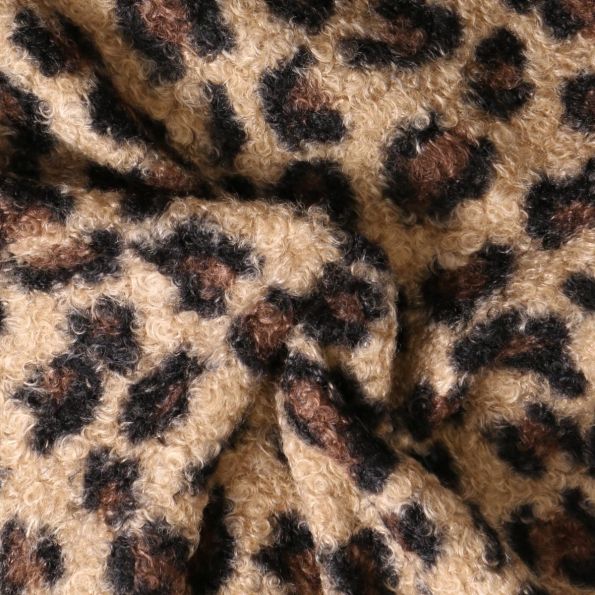 Tissu Fausse fourrure Bouclette Yara motif léopard Chocolat sur fond Beige sable - Par 10 cm