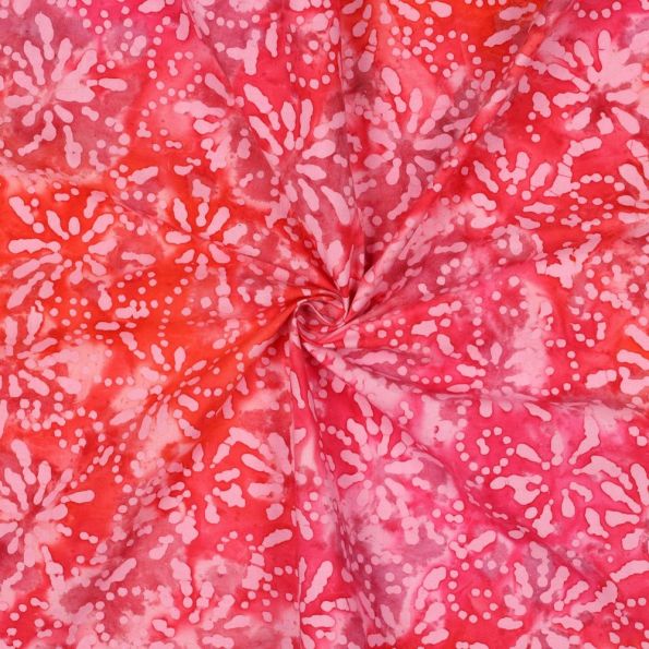 Tissu Batik de Coton rosaces Rose dragée sur fond Rouge - Par 10 cm