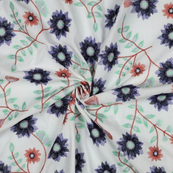 Tissu Coton brodé Fleurs multicolores sur fond Blanc - Par 10 cm