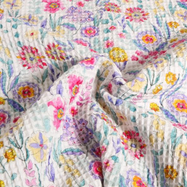 Tissu Nid d'abeille imprimé fleuris sur fond Blanc - Par 10 cm