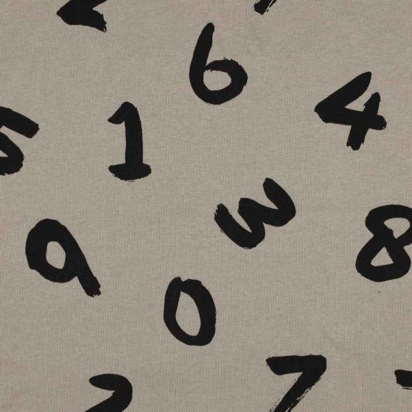 Tissu Sweat envers molletonné Enzo sur fond Beige sable - Par 10 cm