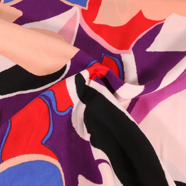 Tissu Viscose Floral abstrait rouge, bleu et noir sur fond Violet - Par 10 cm