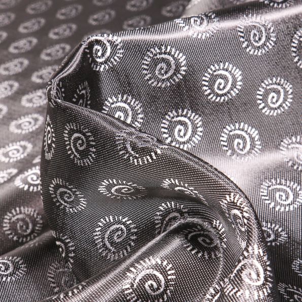 Tissu Satiné Cercles tourbillon sur fond Gris - Par 10 cm