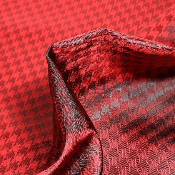 Tissu Satiné Pieds de poules sur fond Rouge - Par 10 cm