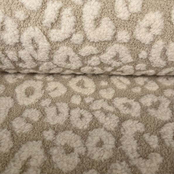 Tissu Fausse fourrure Teddy Panthère Ecru sur fond Beige - Par 10 cm