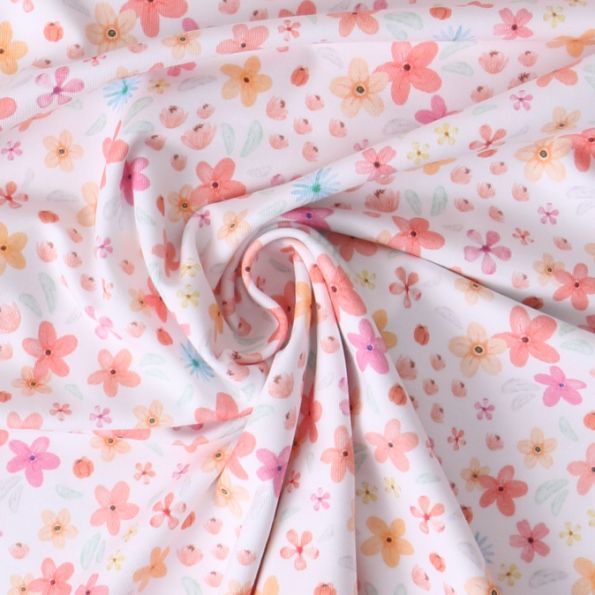 Tissu Jersey stretch fleurs Delya sur fond Blanc - Par 10 cm