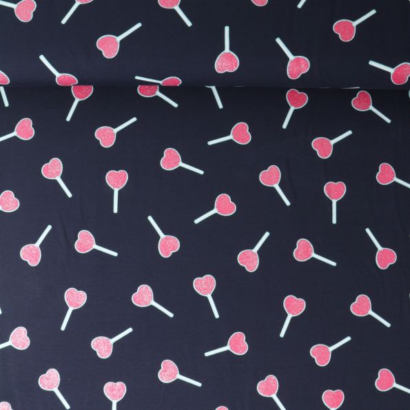 Tissu Jersey stretch Lolly coeurs Rose Paillettés sur fond Bleu marine - Par 10 cm