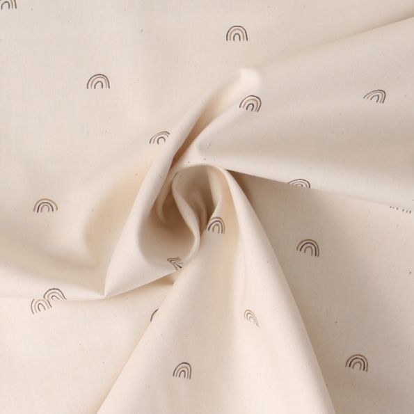 Tissu Coton imprimé arc en ciel Nimoo sur fond Beige clair - Par 10 cm