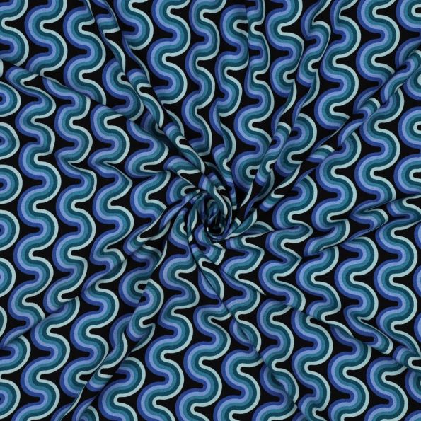 Tissu Viscose imprimé vaguelettes rétro tons Bleu sur fond Noir - Par 10 cm