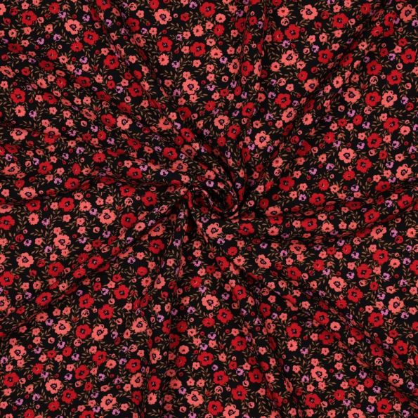 Tissu Viscose imprimé Petites fleurs Corail et Rouge sur fond Noir - Par 10 cm