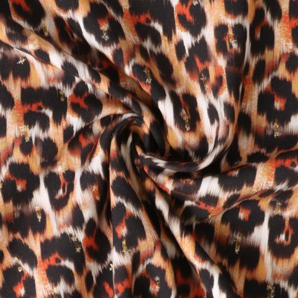 Tissu Viscose Lurex Féline taches fauves et noirs sur fond Blanc - Par 10 cm