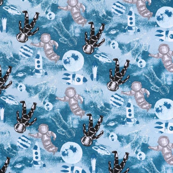 Tissu Jersey Coton envers Molleton Astronautes gris et noirs sur fond Bleu - Par 10 cm