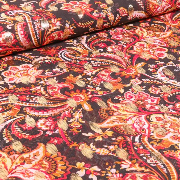 Tissu Mousseline Arabesques fleuris rouge sur fond Noir - Par 10 cm