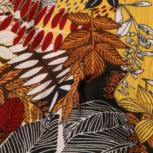 Tissu Crêpe georgette Feuilles rouges jaunes sur fond Noir - Par 10 cm
