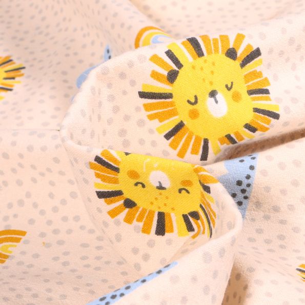 Tissu Coton Lavé Têtes de lion soleil sur fond Ecru - Par 10 cm